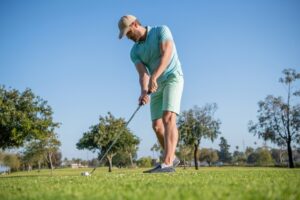 How to Improve Your Golf Stance in Simple Steps Roselle Reviews's set to improve his swing with precision.